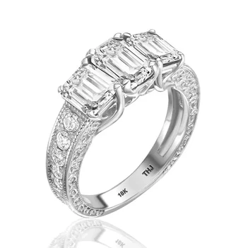 טבעת אירוסין אמרלד עם אבני צד זהב לבן 18K 0.50-1.02CT